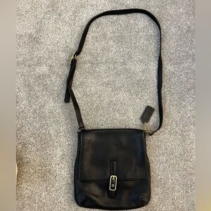 Coach black bag brass buckle